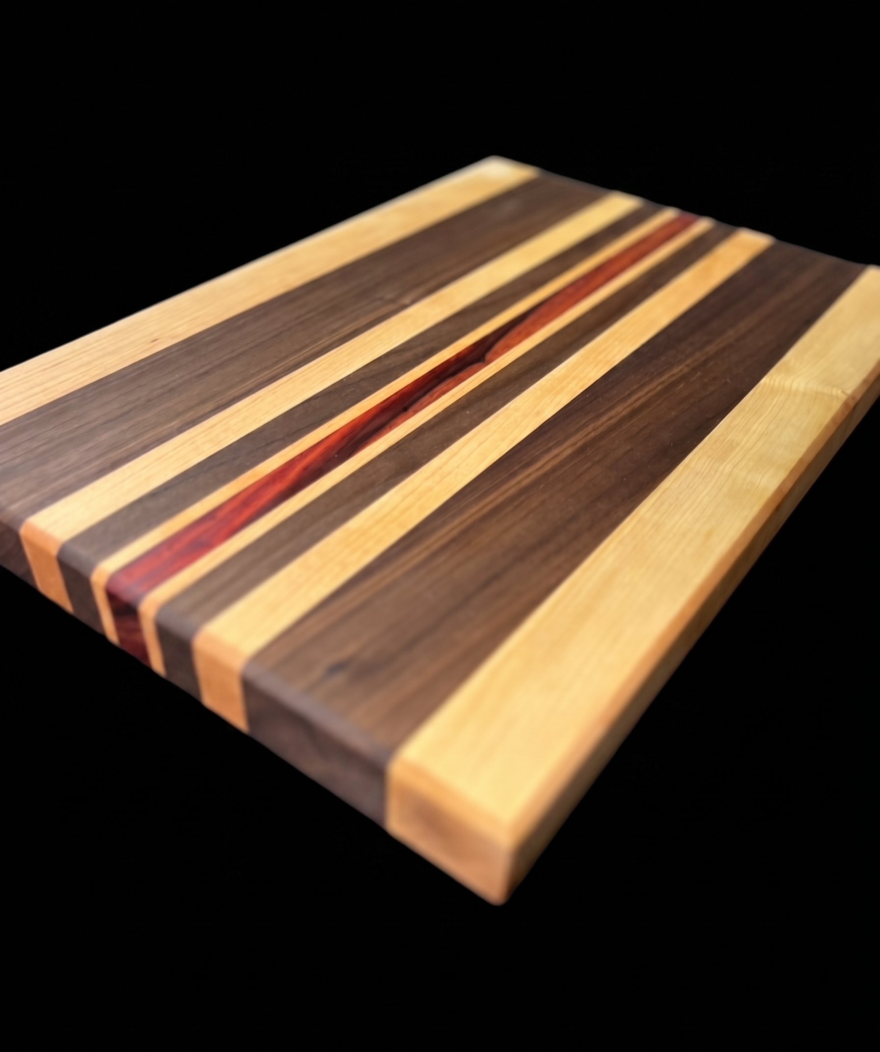 Striped cutting board on dark background