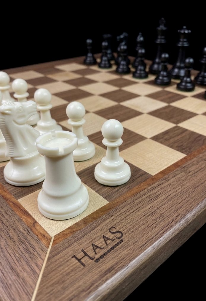 Chess board corner detail with HAAS branding