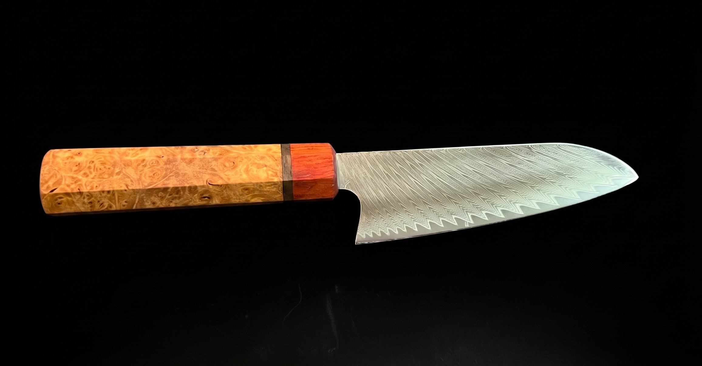 A handmade Damascus chef's knife
